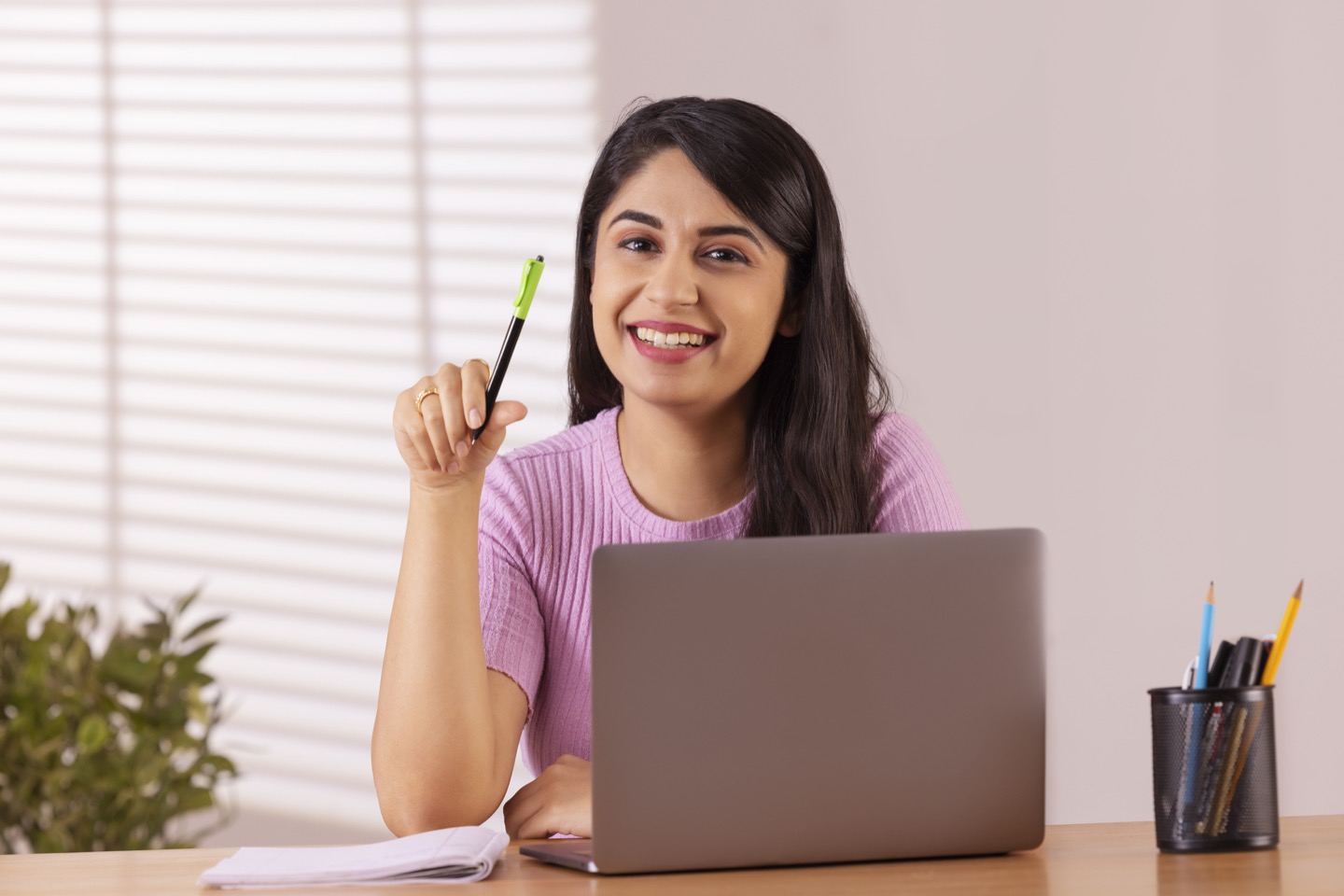 A woman working at her laptop